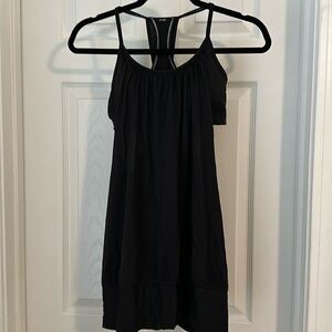 Lululemon black workout top with black built in bra in good condition - size 6